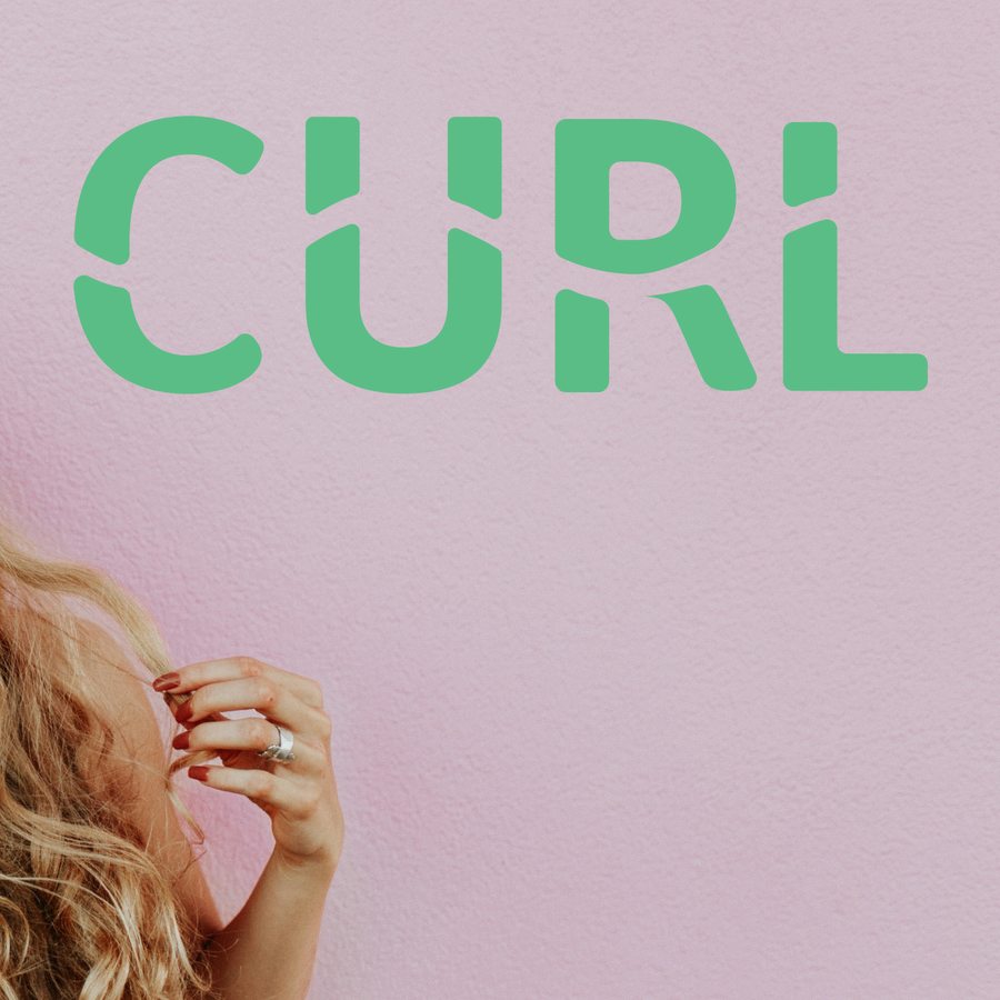 The Curl wordmark in green on a pink wall, beside a model's wavy hair